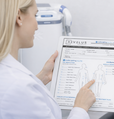 Dermatologist reviewing personalized CoolSculpting Elite body contouring plan on tablet.