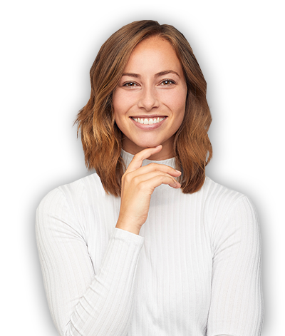 Brunette woman standing in white sweater touching her chin