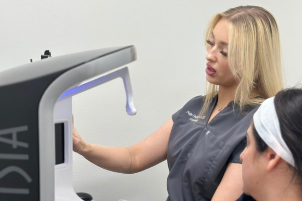 Medical Aesthetician performing a Visia Skin Analysis