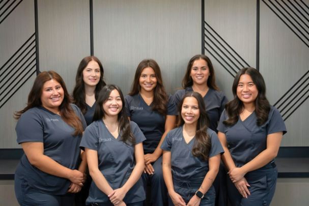 Revelus Dermatology team photo in Austin office