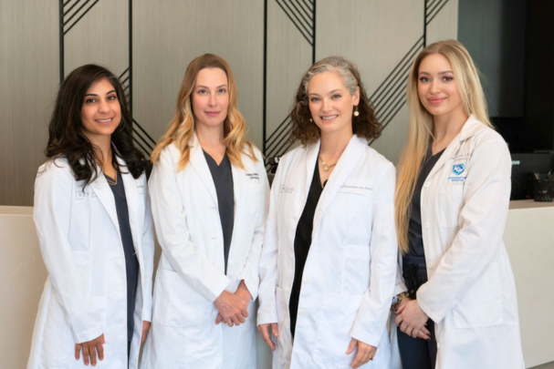 Revelus Dermatology team photo in Austin office